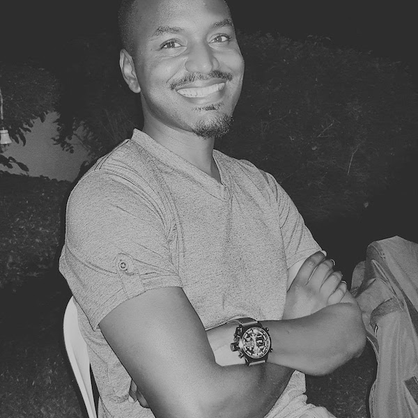 A professional headshot of Martin Balome.